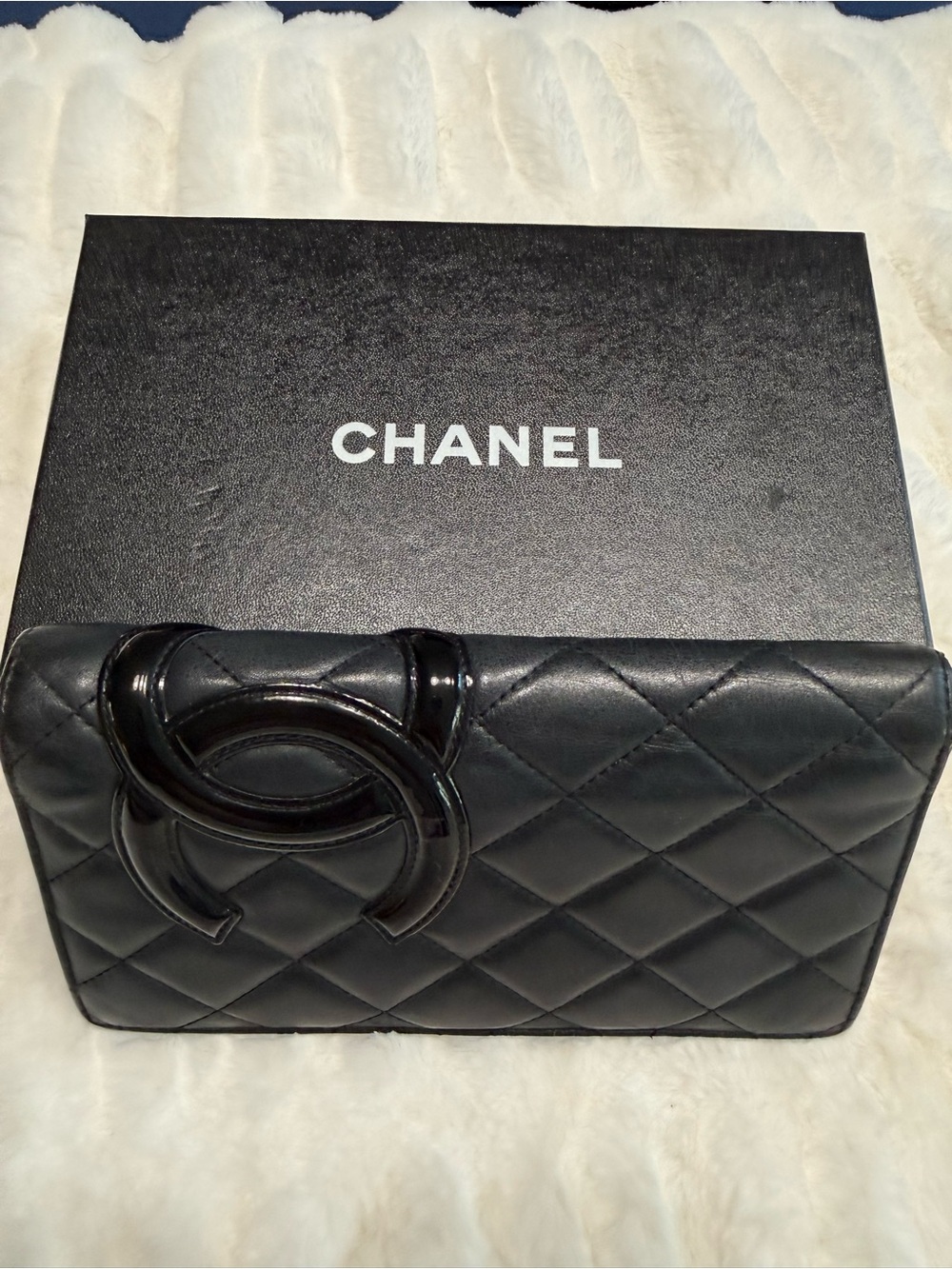 CHANEL Black Quilted Leather Clutch with Oversized CC Accent